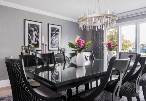 A comfortable yet elegant silver and black dining room